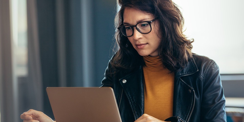 Woman on her computer at home