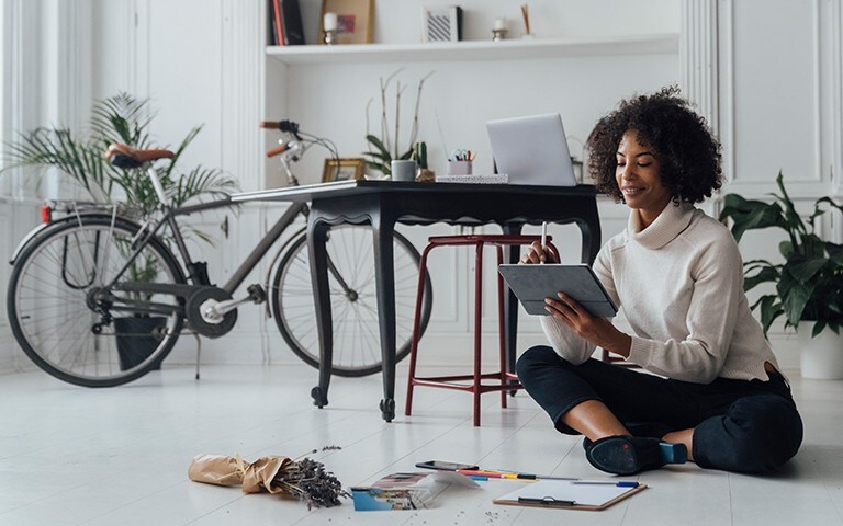 Woman on her computer at home