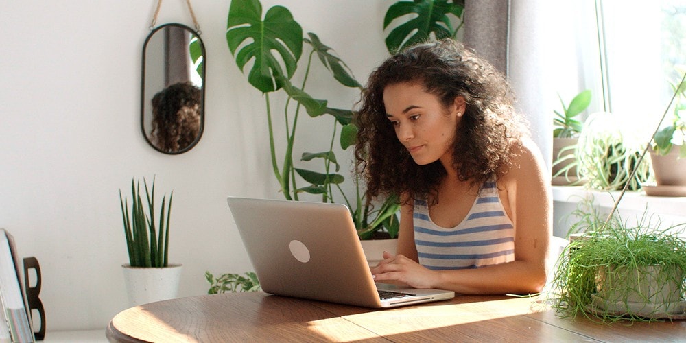 Woman on her computer at home