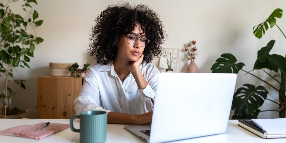 Woman on her computer at home
